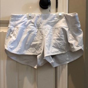 white speed up shorts